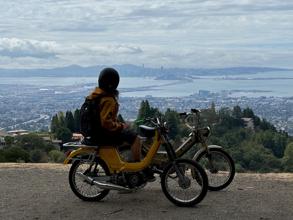 Founders Kyle and Joe with their mopeds